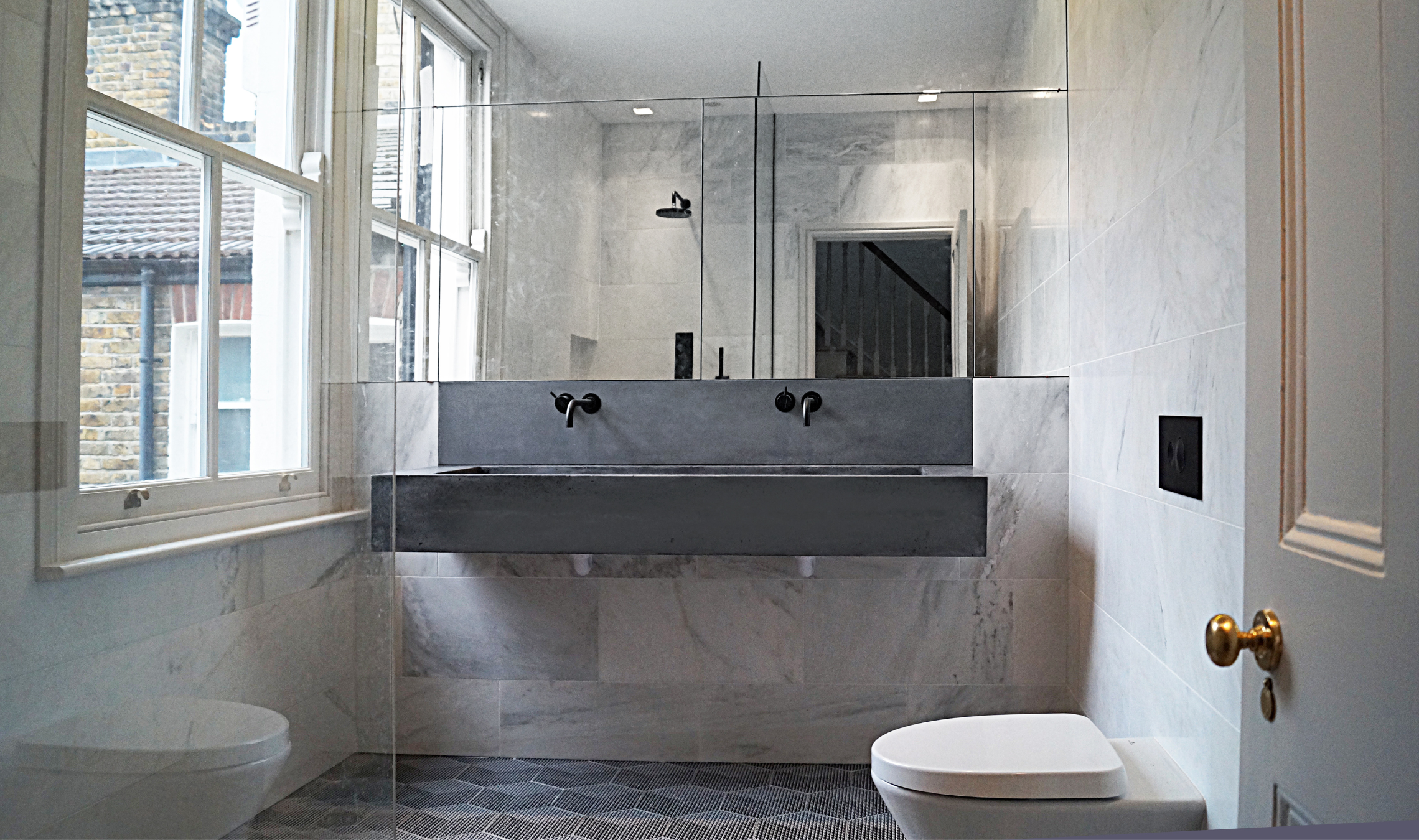 łazienka z betonową umywalką